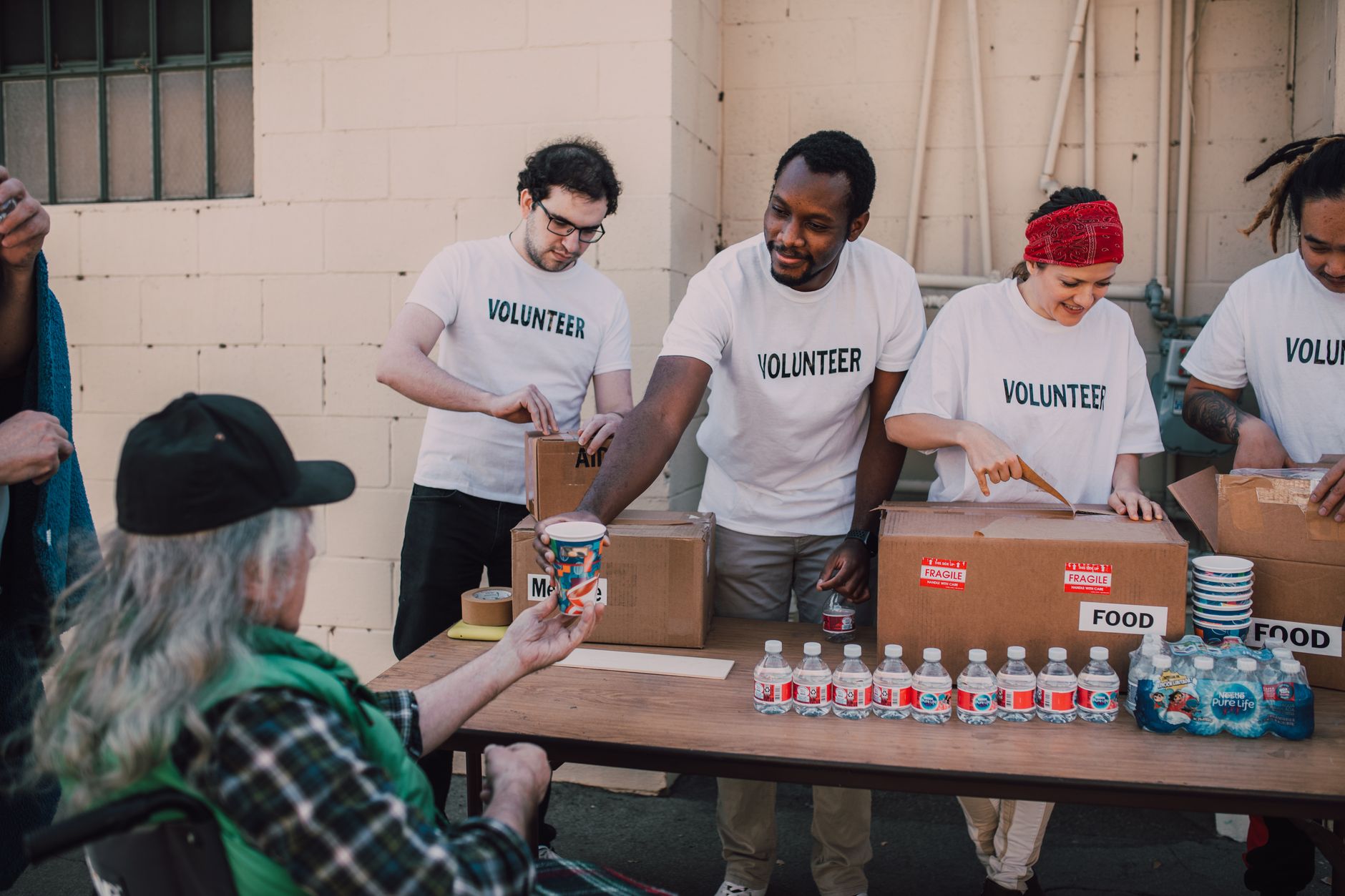 Volunteers serving the community together in warm fellowship